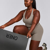 SoftMotion™ Racer Back Mid Vest with Built in Bra Shelf with White Logo | Warm Sand