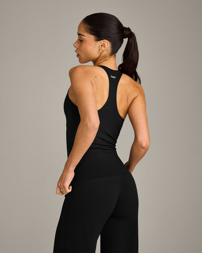 SoftMotion™ Racer Back Vest with Built in Bra Shelf with Grey Logo | Black