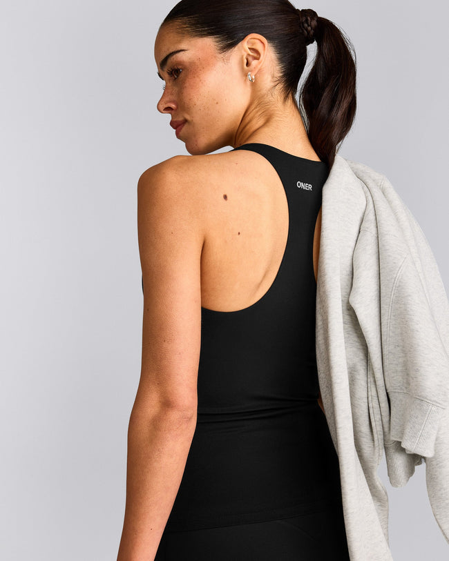 SoftMotion™ Racer Back Vest with Built in Bra Shelf with Grey Logo | Black