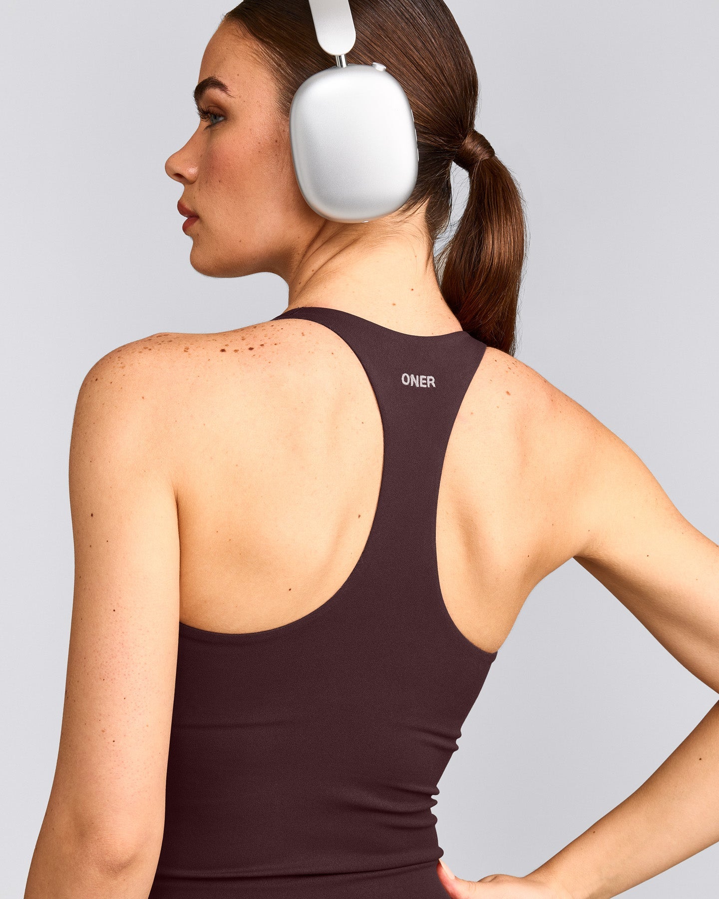 SoftMotion™ Racer Back Vest with Built in Bra Shelf with Grey Logo | Plum Brown