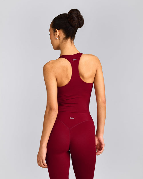 SoftMotion™ Racer Back Mid Vest with Built in Bra Shelf with Grey Logo | Ruby Red