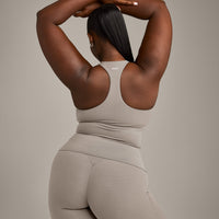 SoftMotion™ Racer Back Vest with Built in Bra Shelf with White Logo | Warm Sand