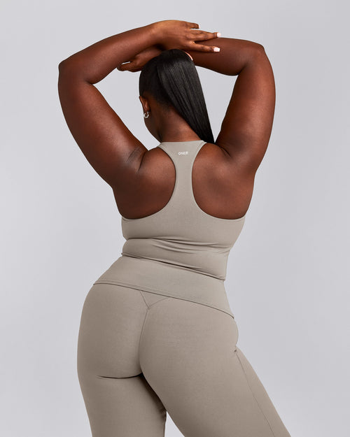 SoftMotion™ Racer Back Vest with Built in Bra Shelf with White Logo | Warm Sand