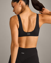SoftMotion™ Scoop Back Bralette with Grey Logo | Black