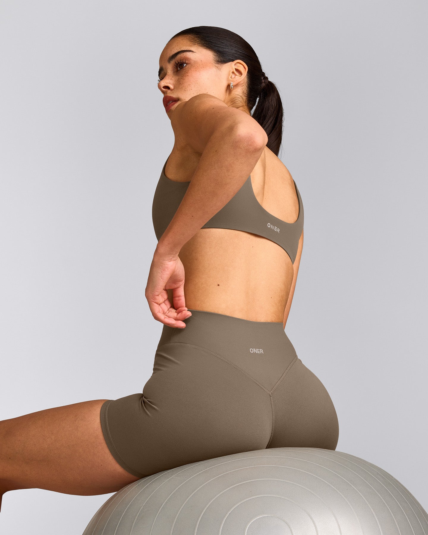SoftMotion™ Scoop Back Bralette with Grey Logo | Moss Brown