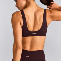 SoftMotion™ Scoop Back Bralette with Grey Logo | Plum Brown