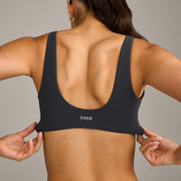 SoftMotion™ Scoop Back Bralette with Grey Logo | Coal