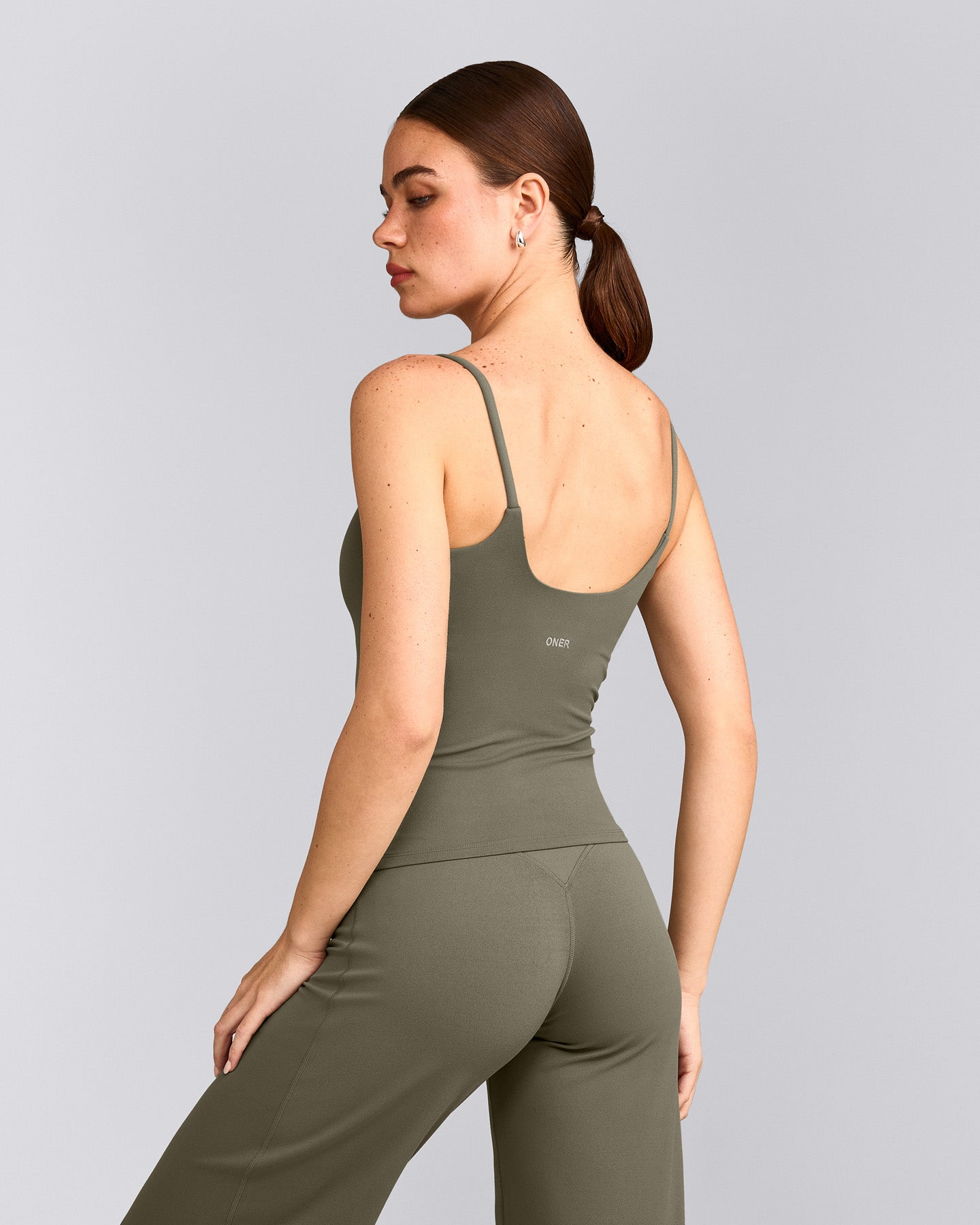 SoftMotion™ Strappy Vest with Built in Bra Shelf with Grey Logo | Alpine Green