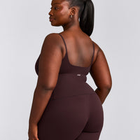 SoftMotion™ Strappy Mid Vest with Built in Bra Shelf with Grey Logo | Plum Brown