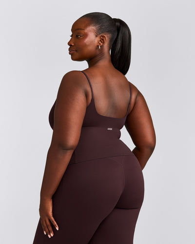 SoftMotion™ Strappy Mid Vest with Built in Bra Shelf with Grey Logo | Plum Brown