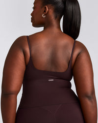 SoftMotion™ Strappy Mid Vest with Built in Bra Shelf with Grey Logo | Plum Brown