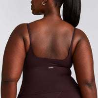 SoftMotion™ Strappy Mid Vest with Built in Bra Shelf with Grey Logo | Plum Brown