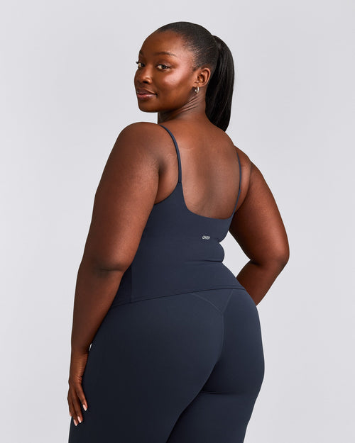 SoftMotion™ Strappy Mid Vest with Built in Bra Shelf with Grey Logo | True Blue