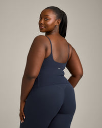 SoftMotion™ Strappy Mid Vest with Built in Bra Shelf with Grey Logo | True Blue