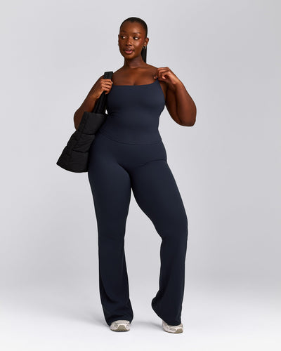 SoftMotion™ Strappy Mid Vest with Built in Bra Shelf with Grey Logo | True Blue