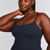 SoftMotion™ Strappy Mid Vest with Built in Bra Shelf with Grey Logo | True Blue