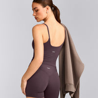 SoftMotion™ Strappy Mid Vest with Built in Bra Shelf with Grey Logo | Dark Umber Brown