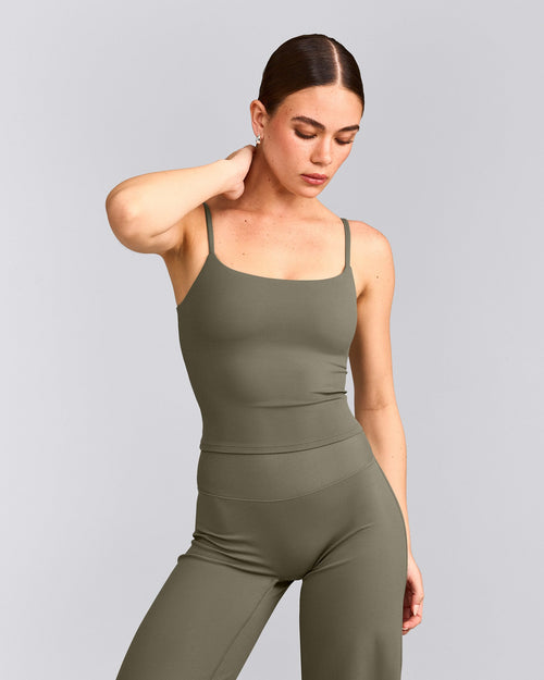 SoftMotion™ Strappy Mid Vest with Built in Bra Shelf with Grey Logo | Alpine Green