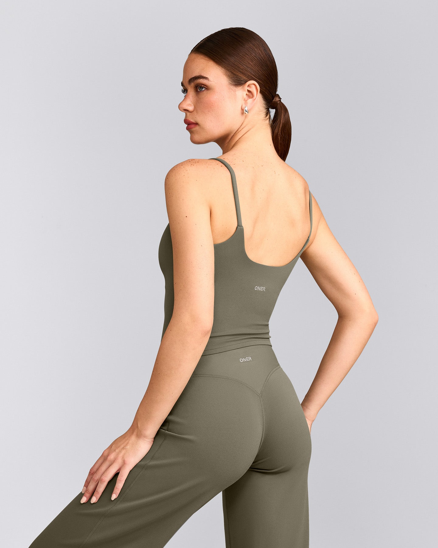 SoftMotion™ Strappy Mid Tank Top with Built in Bra Shelf with Grey Logo | Alpine Green