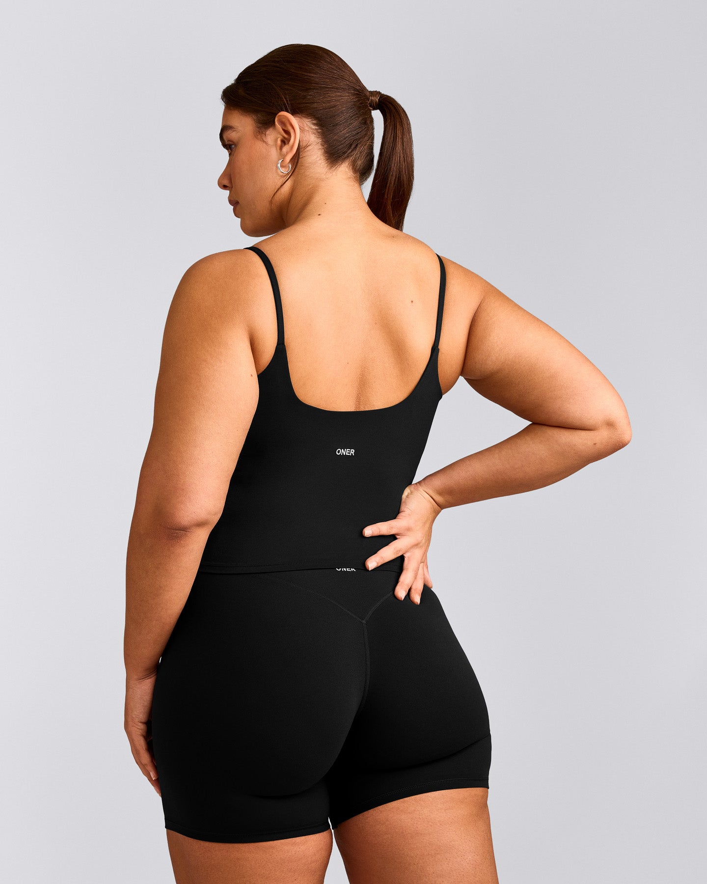 SoftMotion™ Strappy Vest with Built in Bra Shelf with Grey Logo | Black