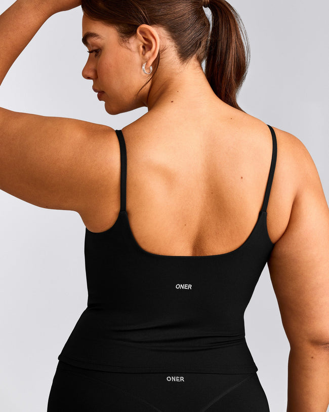 SoftMotion™ Strappy Vest with Built in Bra Shelf with Grey Logo | Black