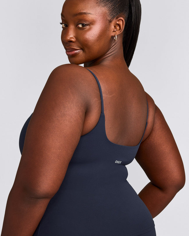 SoftMotion™ Strappy Vest with Built in Bra Shelf with Grey Logo | True Blue