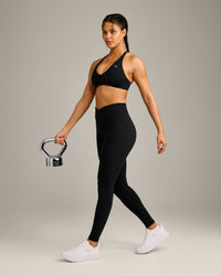 UnifiedMove Wrap Leggings with Reflective Logo | Black