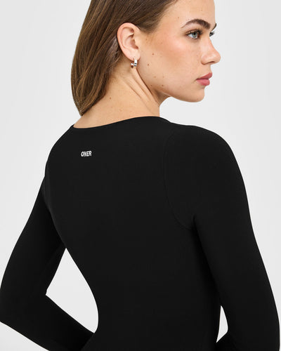 SoftMotion™ Scoop Neck Long Sleeve Top with Built in Bra Shelf with White Logo | Black
