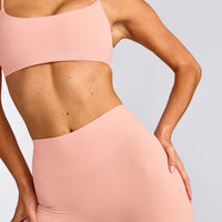 SoftMotion™ High Waisted Capri Leggings with Grey Logo | Peach Orange