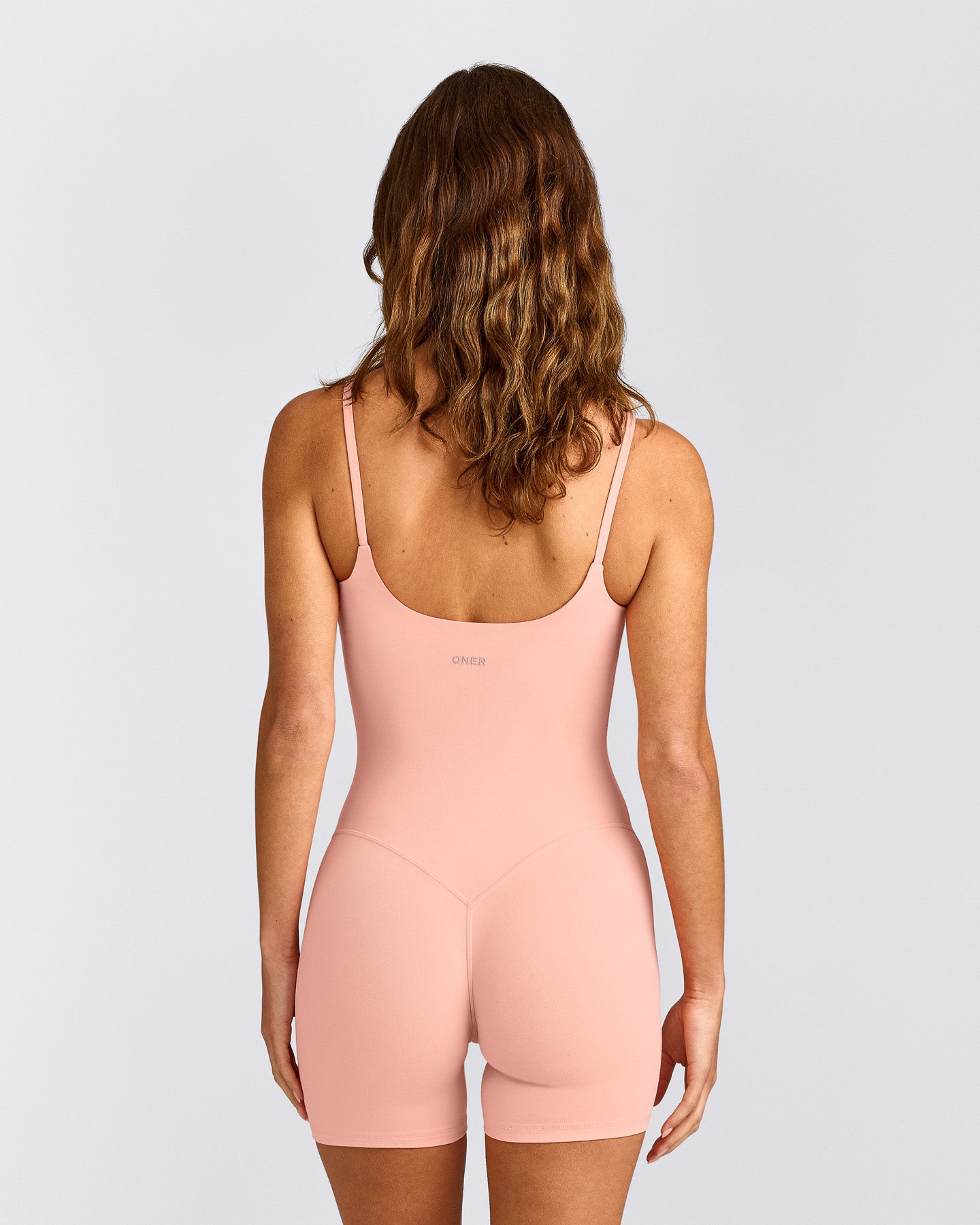 SoftMotion™ Strappy All in One with Grey Logo | Peach Orange