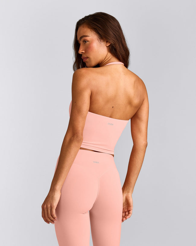 SoftMotion™ Strappy Halter Neck Mid Vest with Built in Bra Shelf with Grey Logo | Peach Orange
