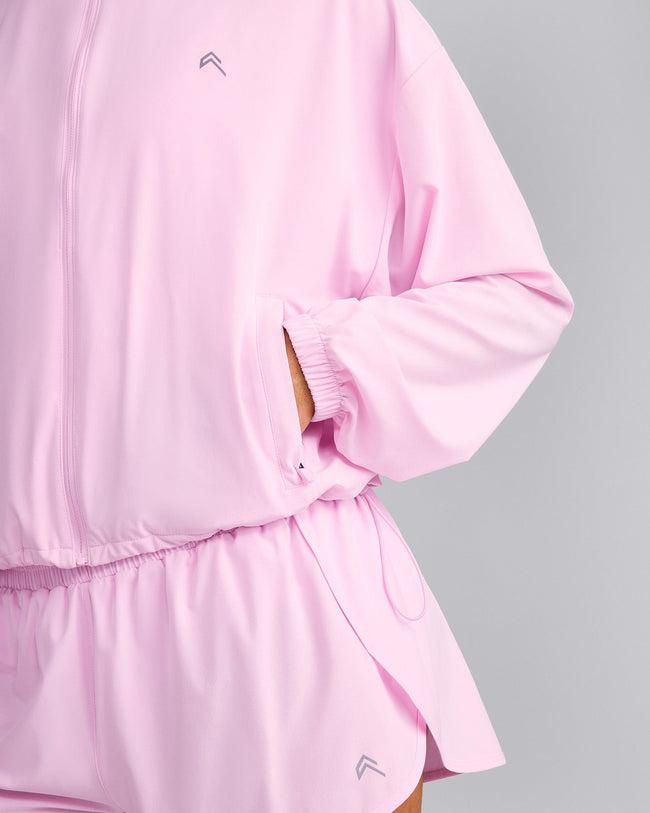 AirMove™ Jacket with Reflective Logo | Chalk Pink