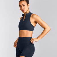 EasyLift™ Zip High Neck Sports Bra with Grey Logo | True Blue