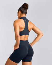 EasyLift™ Zip High Neck Sports Bra with Grey Logo | True Blue