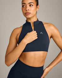 EasyLift™ Zip High Neck Sports Bra with Grey Logo | True Blue