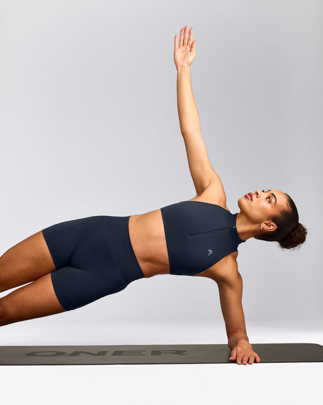 EasyLift™ Zip High Neck Sports Bra with Grey Logo | True Blue