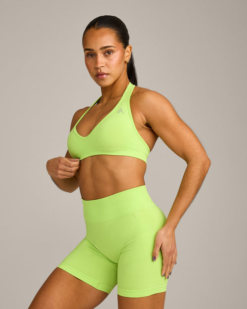 Oner Modal EffortlessLift™ Seamless Halter Neck Sports Bra with Grey Logo | Citrus Green