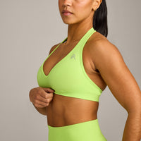 EffortlessLift™ Seamless Halter Neck Sports Bra with Grey Logo | Citrus Green