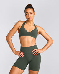 EffortlessLift™ Seamless Halter Neck Sports Bra with Grey Logo | Dark Khaki