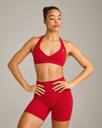 EffortlessLift™ Seamless Halter Neck Sports Bra with Grey Logo | Fiery Red