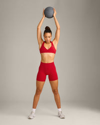EffortlessLift™ Seamless Halter Neck Sports Bra with Grey Logo | Fiery Red