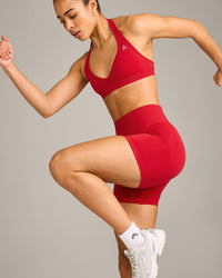 EffortlessLift™ Seamless Halter Neck Sports Bra with Grey Logo | Fiery Red