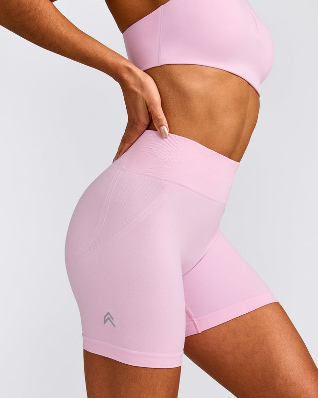 EffortlessLift™ Seamless Mid Rise Shorts with Grey Logo | Chalk Pink