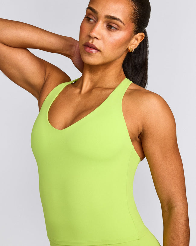 SoftMotion™ Racer Back Mid Vest with Built in Bra Shelf with Grey Logo | Citrus Green