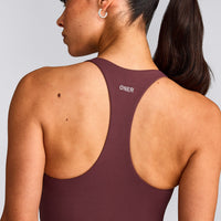 SoftMotion™ Racer Back Mid Vest with Built in Bra Shelf with Grey Logo | Velvet Mocha