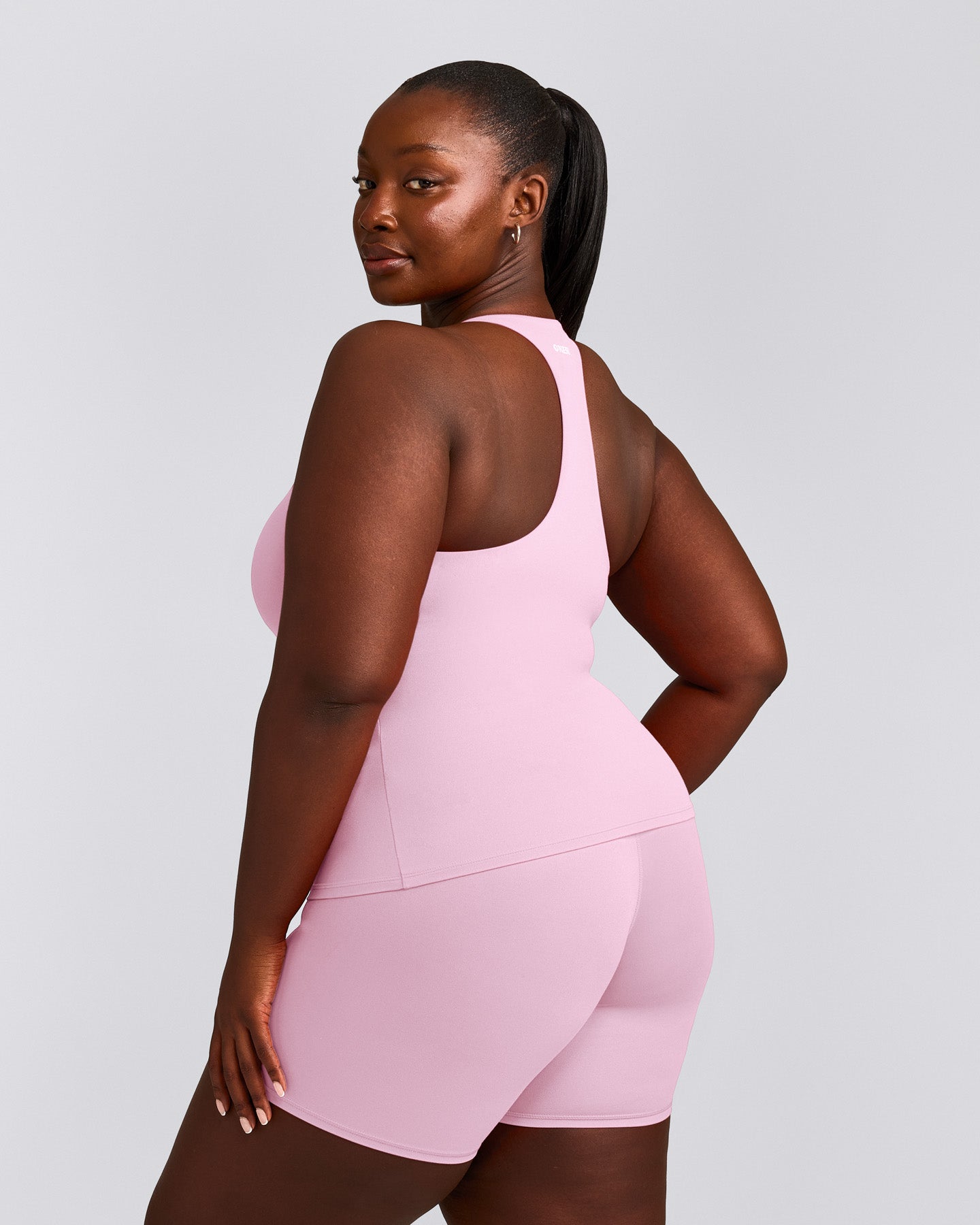 SoftMotion™ Racer Back Vest with Built in Bra Shelf with Grey Logo | Chalk Pink