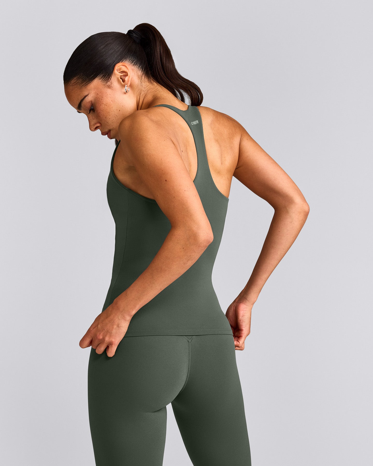 SoftMotion™ Racer Back Tank Top with Built in Bra Shelf with Grey Logo | Dark Khaki