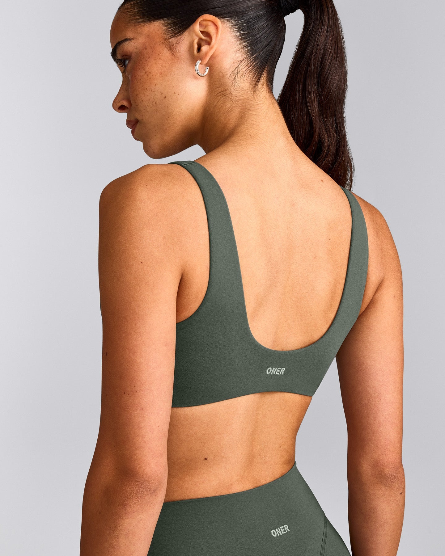 SoftMotion™ Scoop Back Bralette with Grey Logo | Dark Khaki