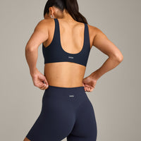 SoftMotion™ Scoop Back Bralette with Grey Logo | True Blue