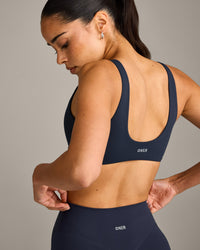 SoftMotion™ Scoop Back Bralette with Grey Logo | True Blue